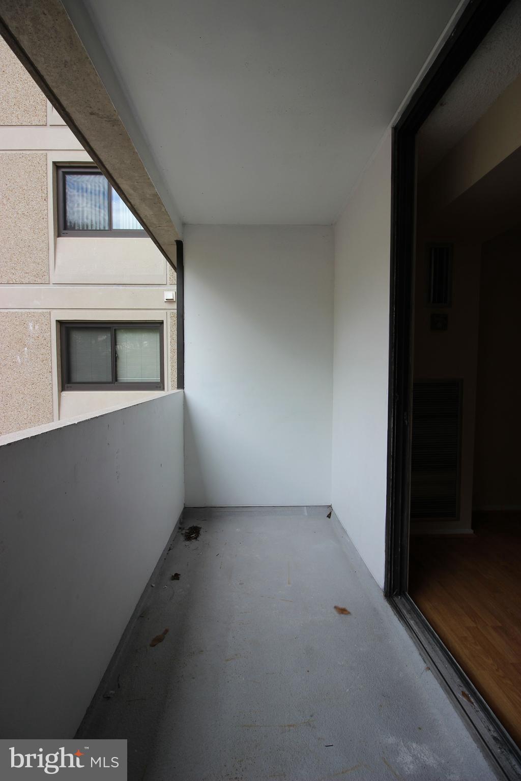 5911 Edsall Road, Unit 405 Alexandria, VA 22304 - Photo 17 of 23 a view of an empty room with a window