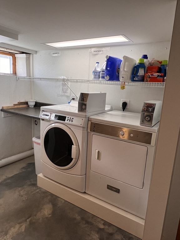 24 Proctor Street, Unit 2 Peabody, MA 01960 - Photo 15 of 19 a utility room with dryer and washer