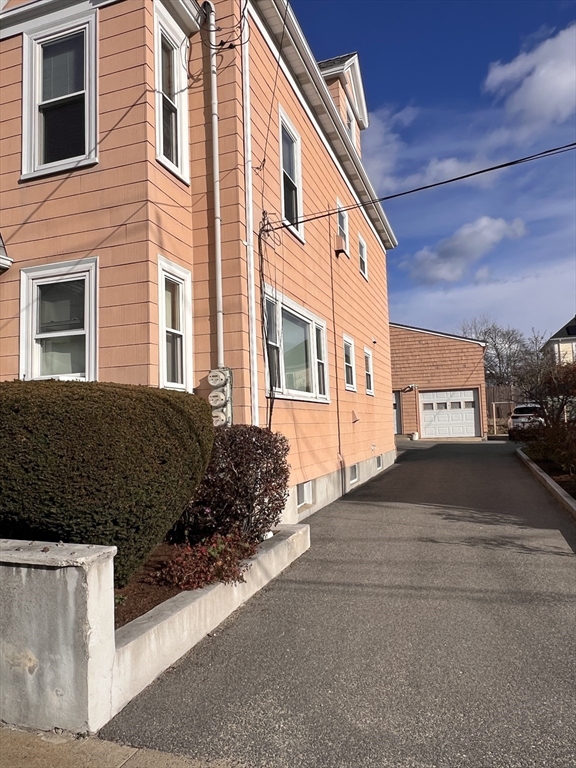 24 Proctor Street, Unit 2 Peabody, MA 01960 - Photo 18 of 19 a view of a building along the street