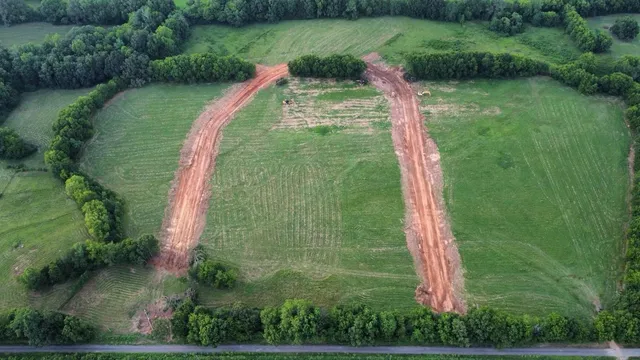 a view of a lake with a park