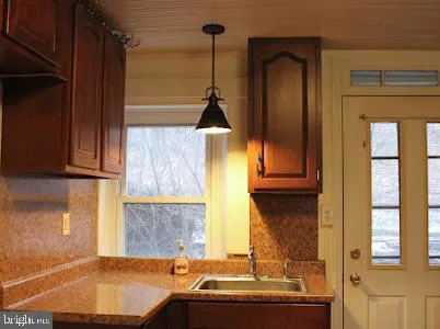 a bathroom with a sink and a bathtub