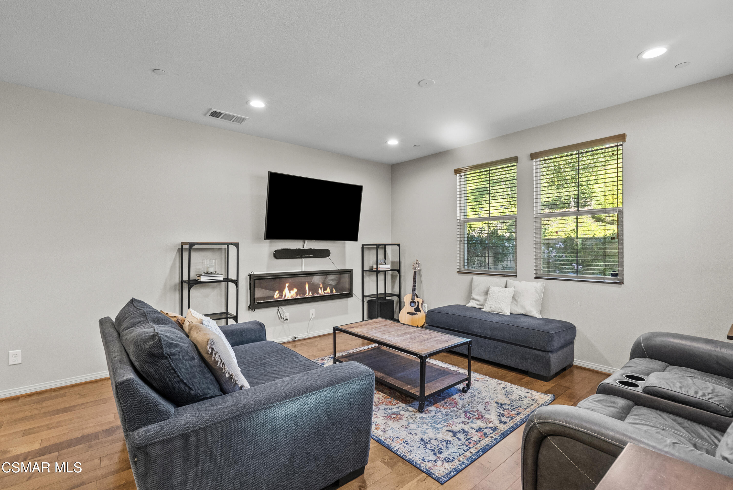 6441 Summit Village Lane, Unit 3 Simi Valley, CA 93063 - Photo 14 of 41 a living room with furniture and a flat screen tv
