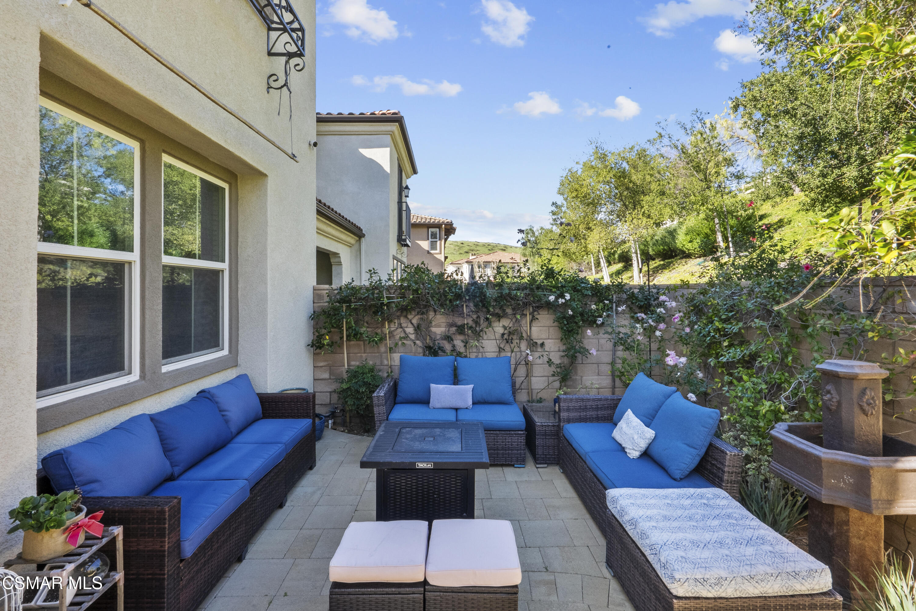 6441 Summit Village Lane, Unit 3 Simi Valley, CA 93063 - Photo 30 of 41 a outdoor living space with furniture and a potted plant