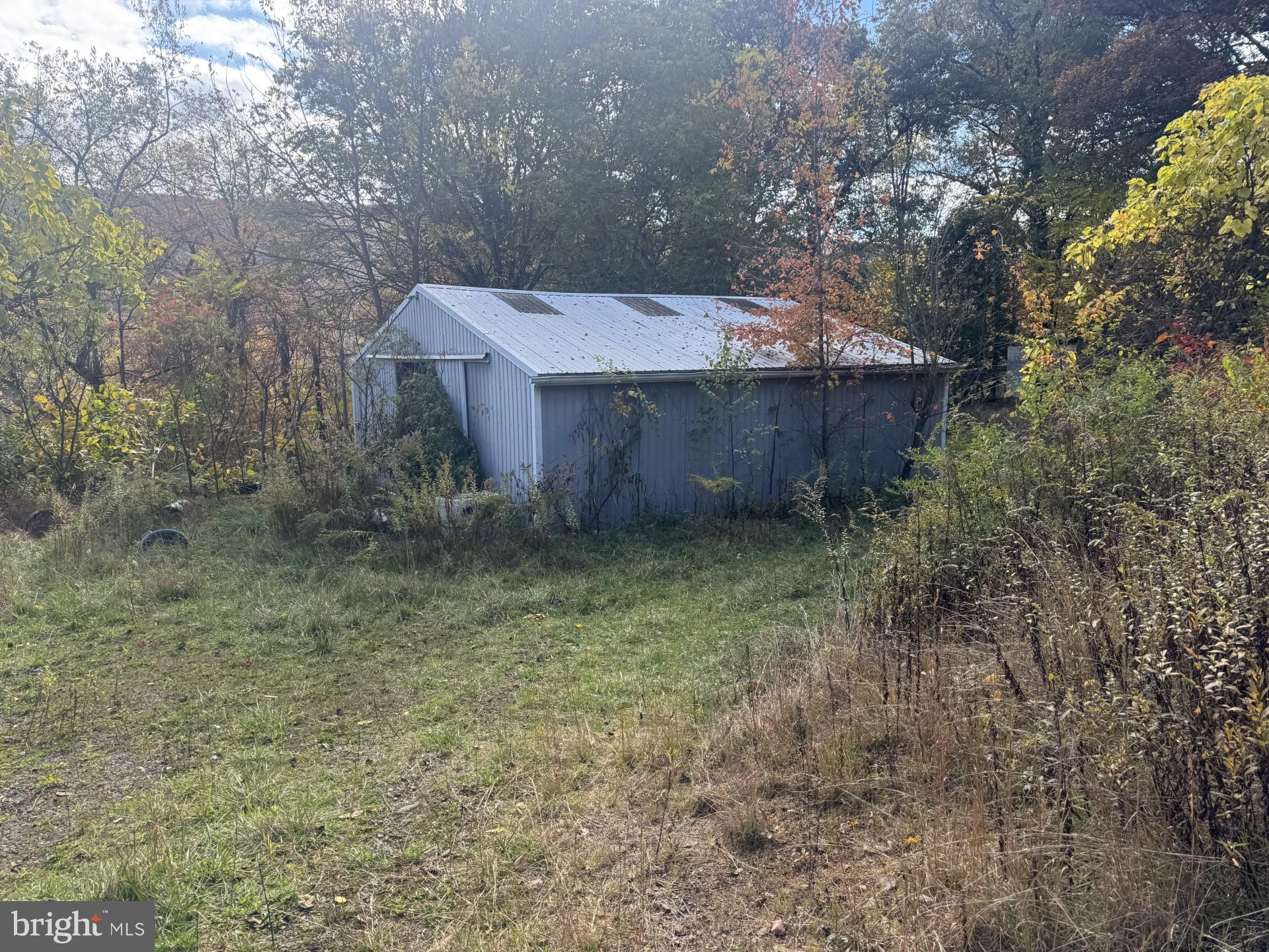 6852 Upper Road Shamokin, PA 17872 - Photo 36 of 41 Poll Building, road to back of property,
