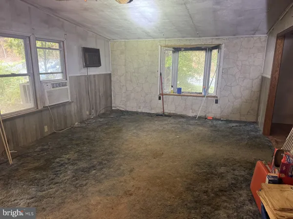 an empty room with windows