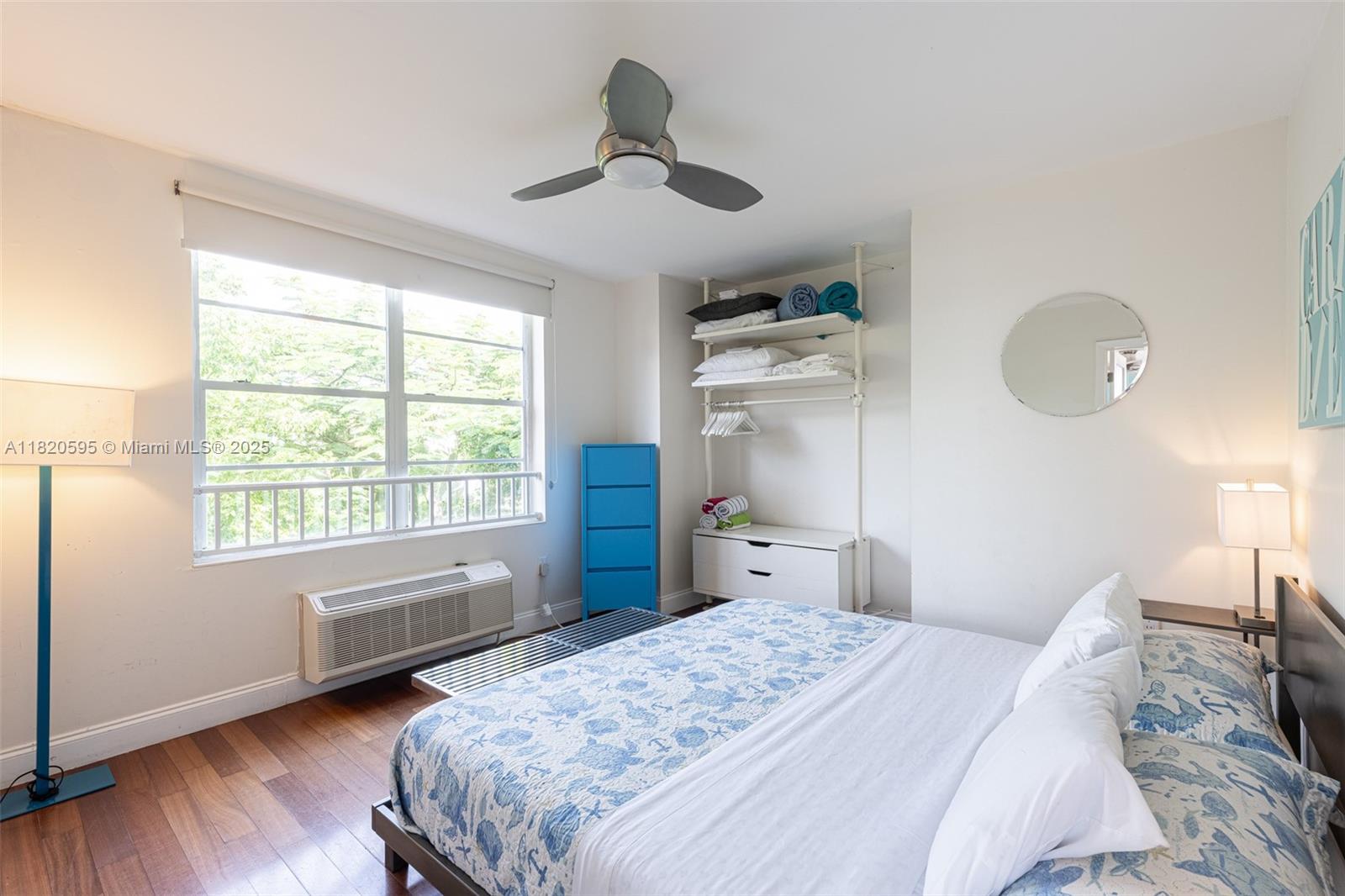 420 15th Street, Unit 307 Miami Beach, FL 33139 - Photo 12 of 22 a bedroom with a bed and a window
