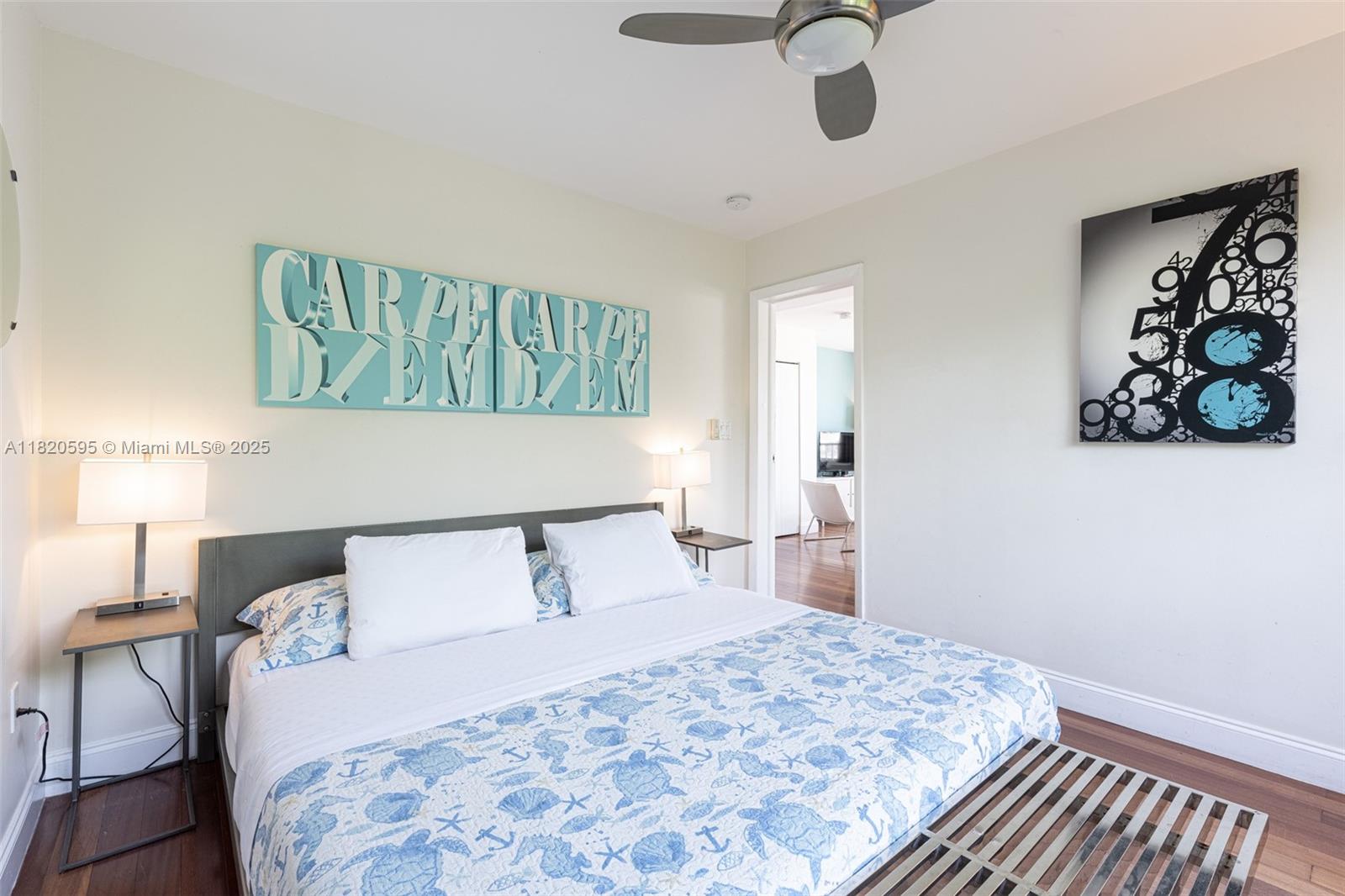 420 15th Street, Unit 307 Miami Beach, FL 33139 - Photo 16 of 22 a bedroom with a bed and window