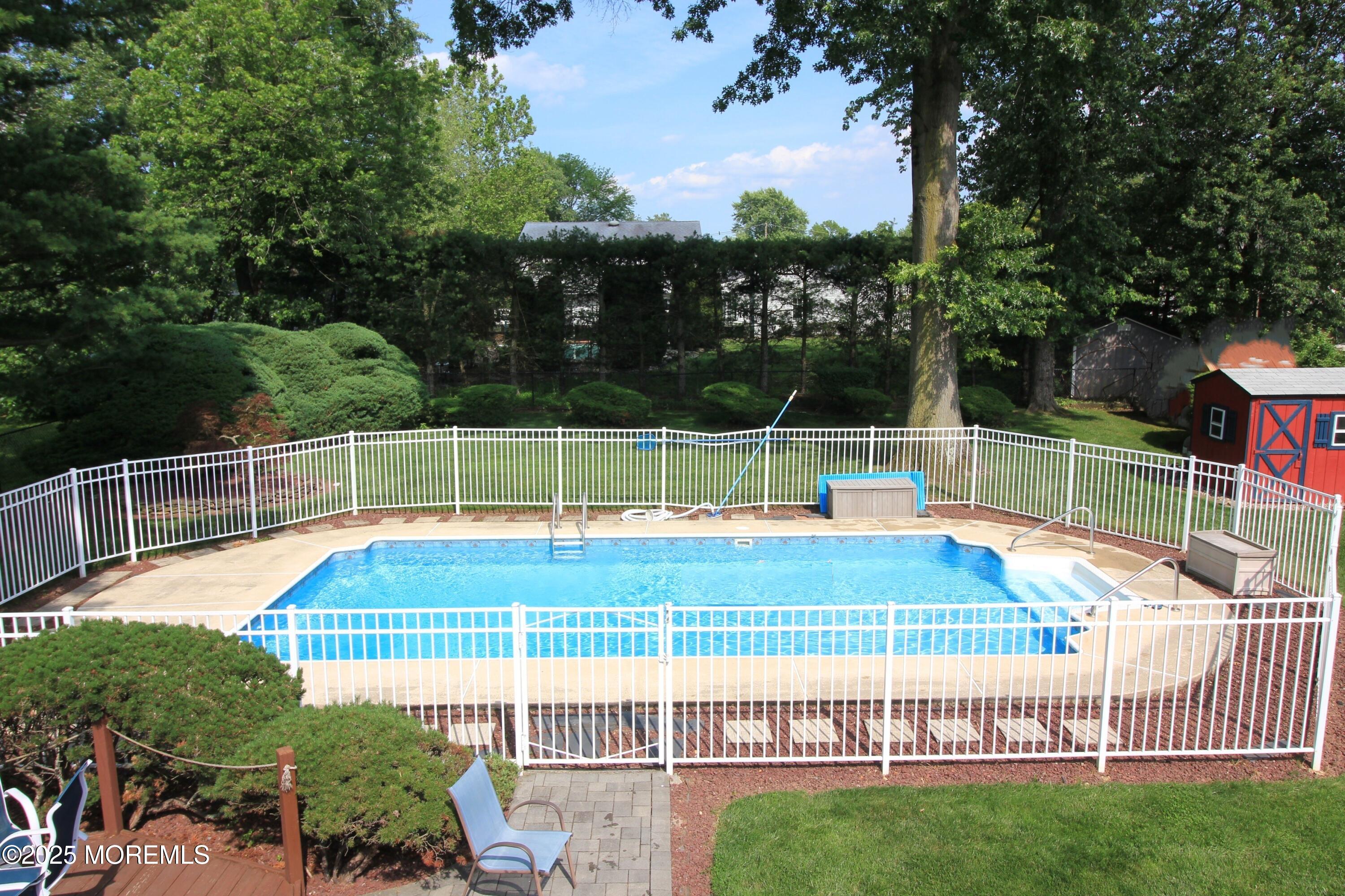 5 Lowell Road Manalapan, NJ 07726 - Photo 38 of 43 Pool from Deck 3