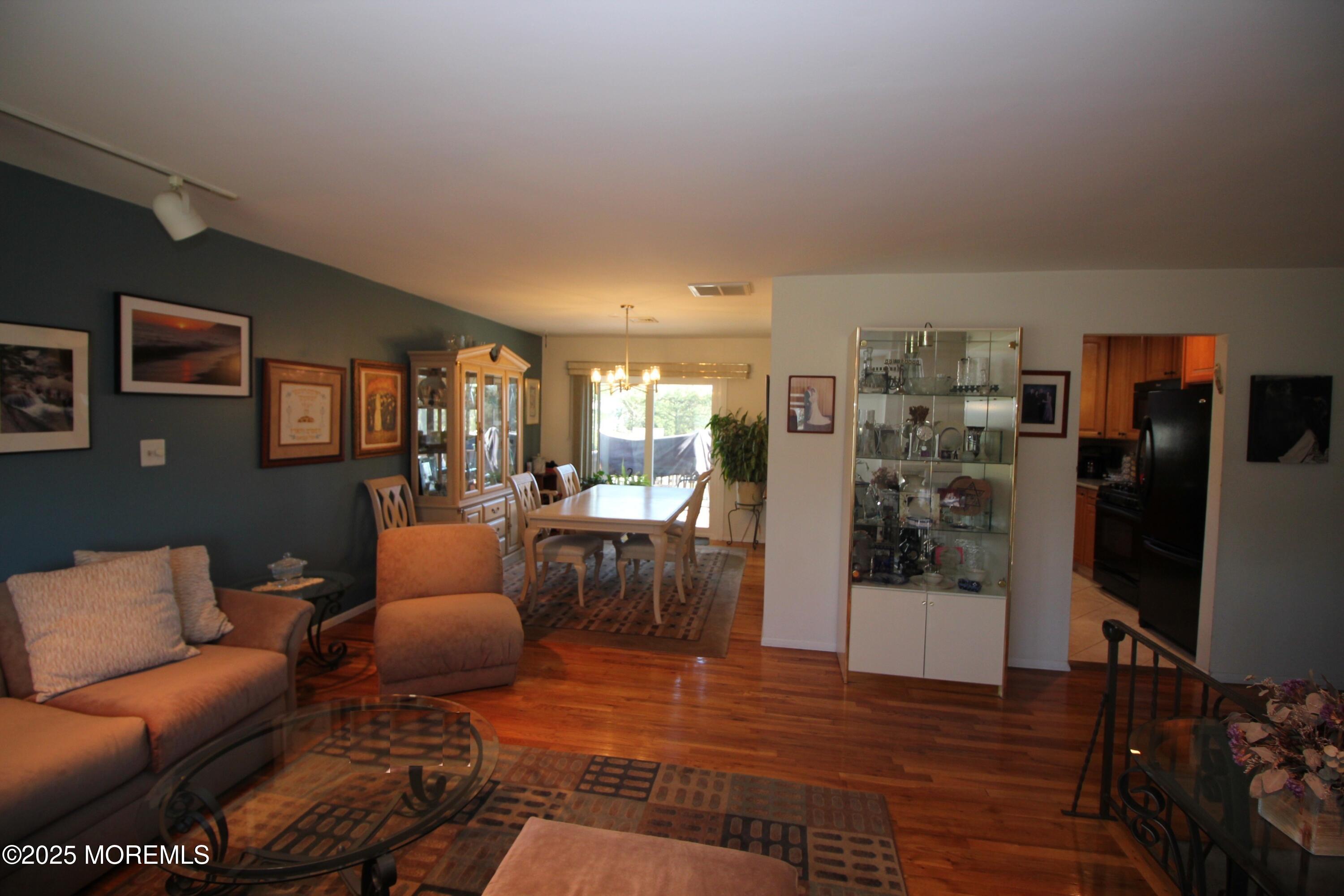 5 Lowell Road Manalapan, NJ 07726 - Photo 8 of 43 3d Living Room Towards Dining Room