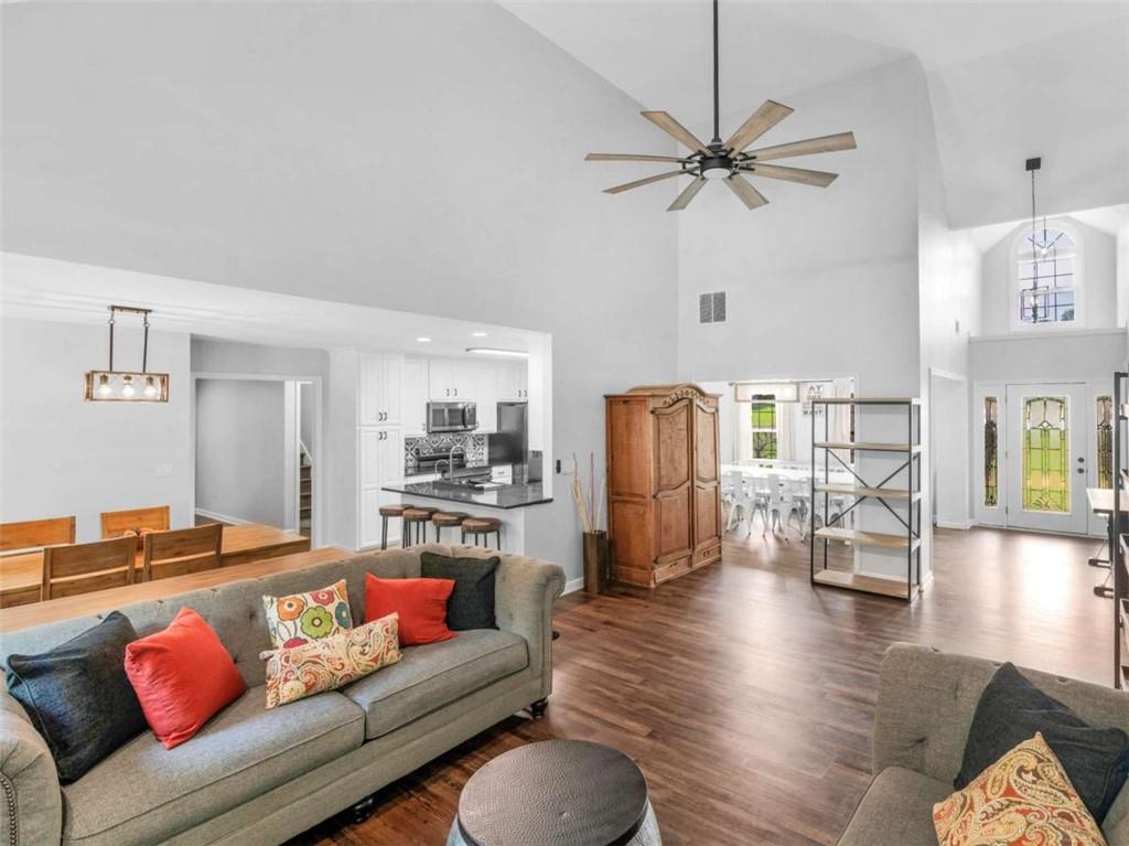 545 Barhams Ridge Drive McDonough, GA 30252 - Photo 12 of 62 a living room with furniture and a view of kitchen