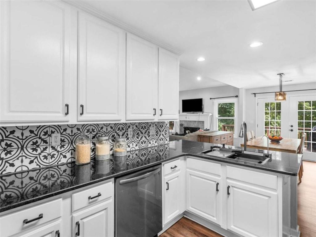 545 Barhams Ridge Drive McDonough, GA 30252 - Photo 22 of 62 a kitchen with stainless steel appliances granite countertop a sink a stove and a granite counter tops