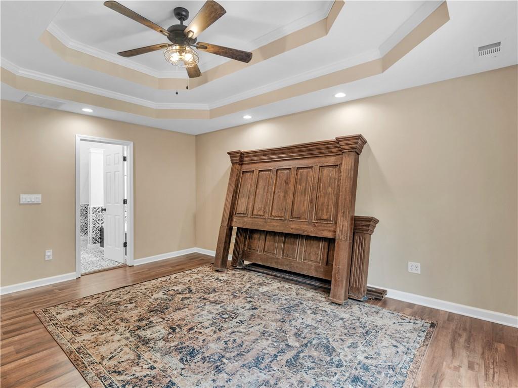 545 Barhams Ridge Drive McDonough, GA 30252 - Photo 23 of 62 a bedroom with a bed and a window