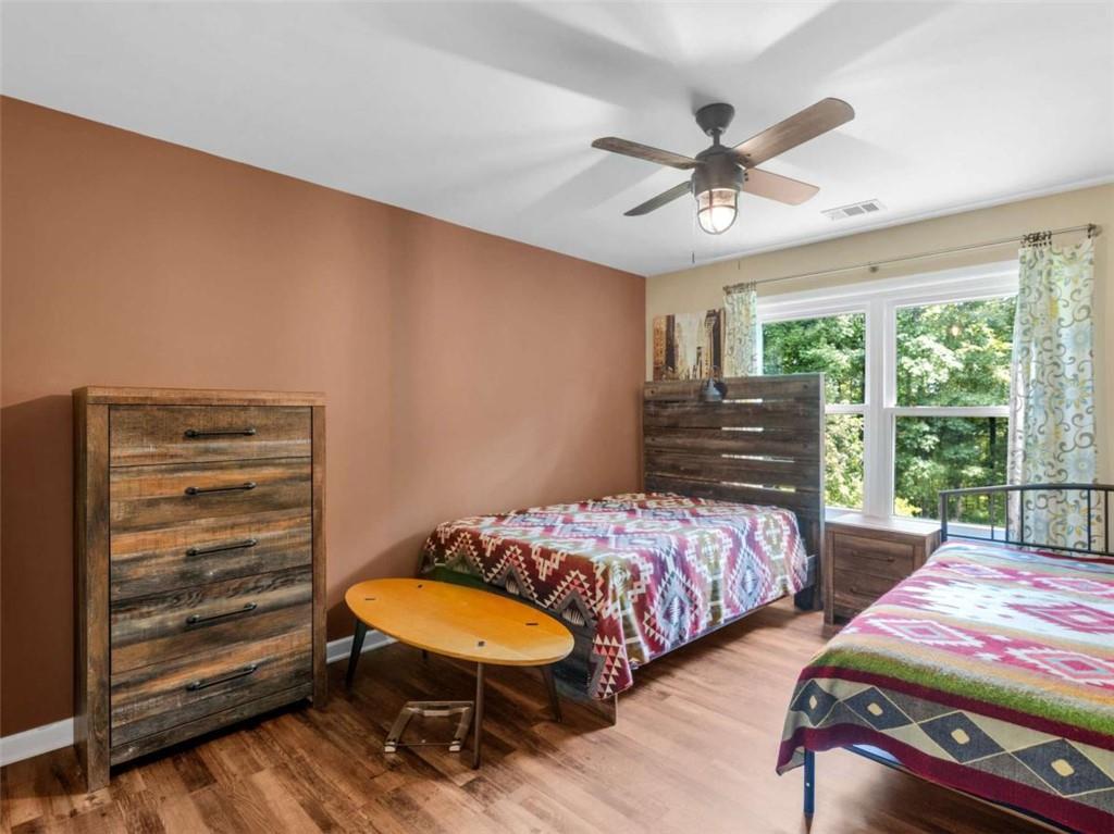 545 Barhams Ridge Drive McDonough, GA 30252 - Photo 35 of 62 a bedroom with two beds and a window