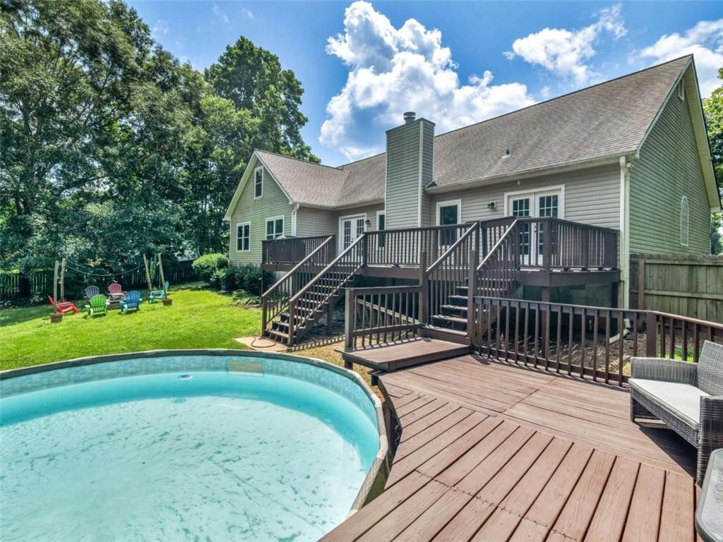 545 Barhams Ridge Drive McDonough, GA 30252 - Photo 54 of 62 a view of a house with a patio
