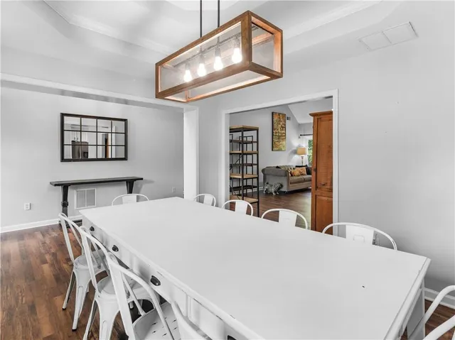 a living room with furniture flat screen tv and a fireplace