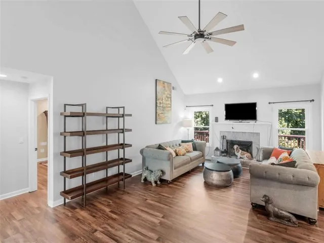 a kitchen with stainless steel appliances and chandelier