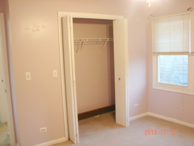 5353 Joshua Court Gurnee, IL 60031 - Photo 13 of 22 an empty room with windows