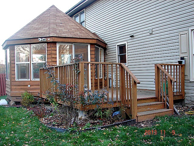 5353 Joshua Court Gurnee, IL 60031 - Photo 20 of 22 a front view of a house with a garden