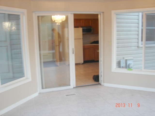5353 Joshua Court Gurnee, IL 60031 - Photo 9 of 22 an entryway at an empty room with a window