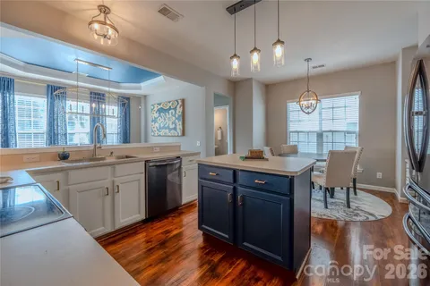 a large kitchen with a large island in it