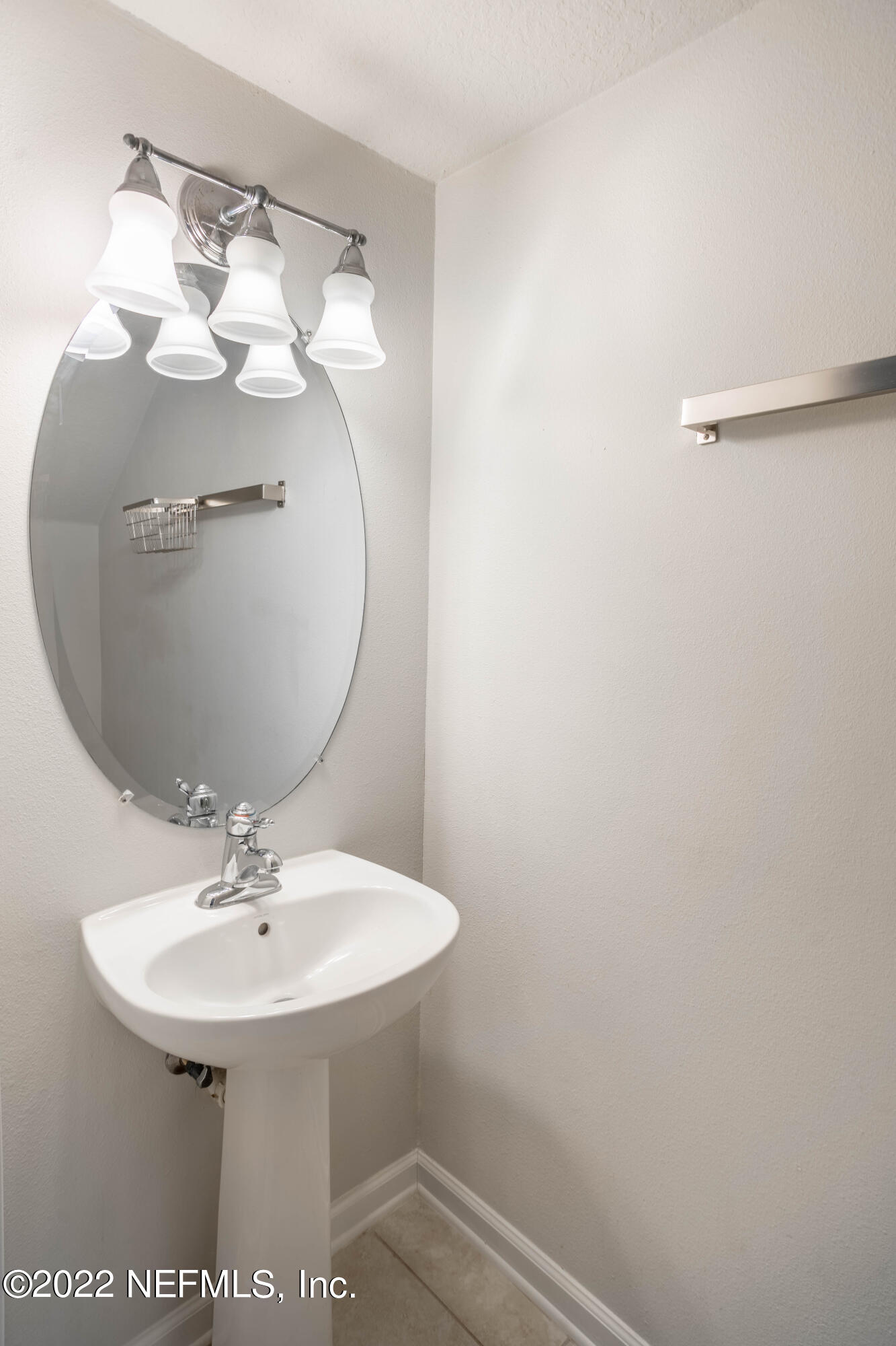 8085 Summerside Circle Jacksonville, FL 32256 - Photo 11 of 21 a bathroom with a sink and mirror
