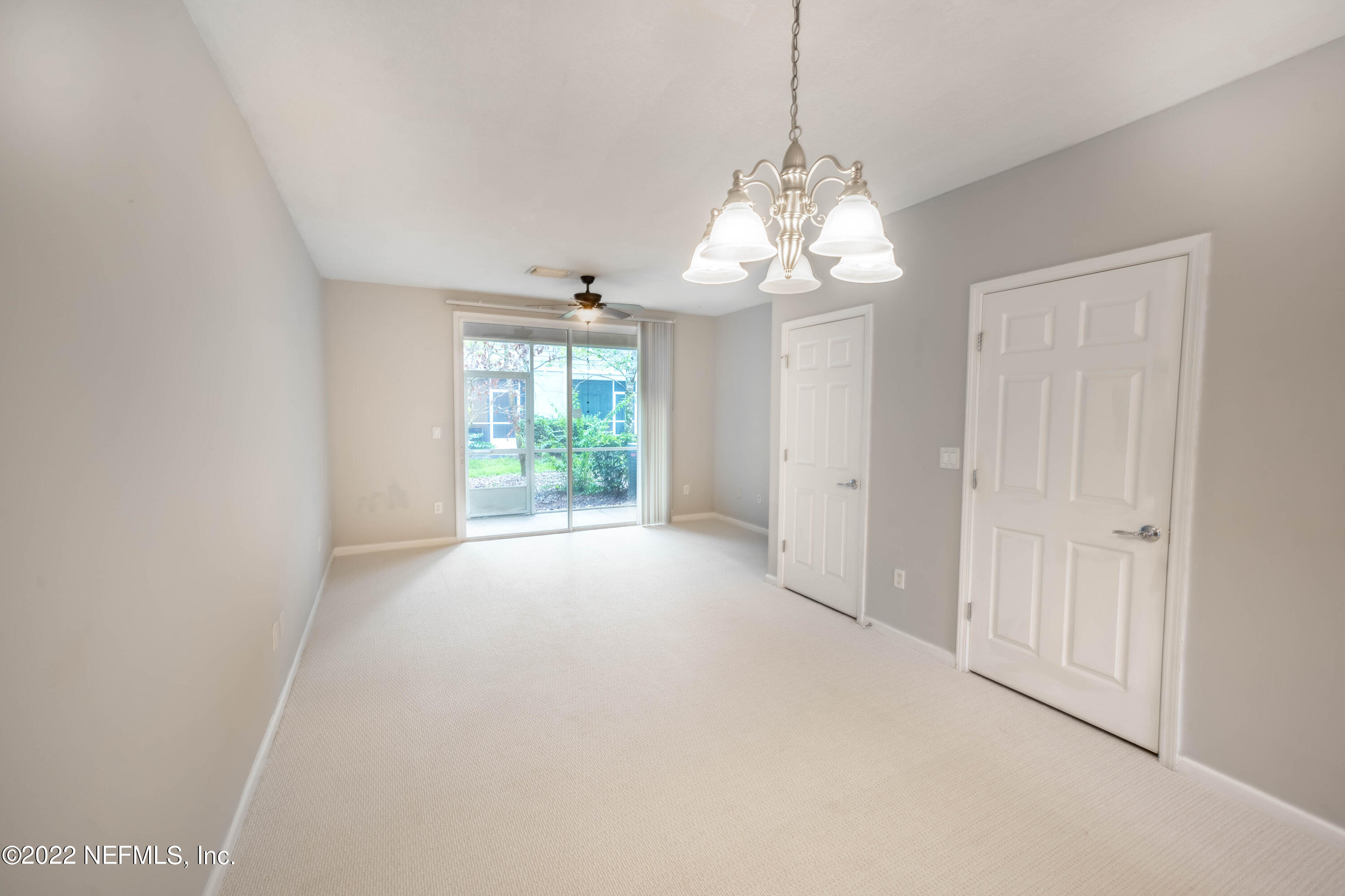 8085 Summerside Circle Jacksonville, FL 32256 - Photo 8 of 21 a view of a chandelier and window in a room