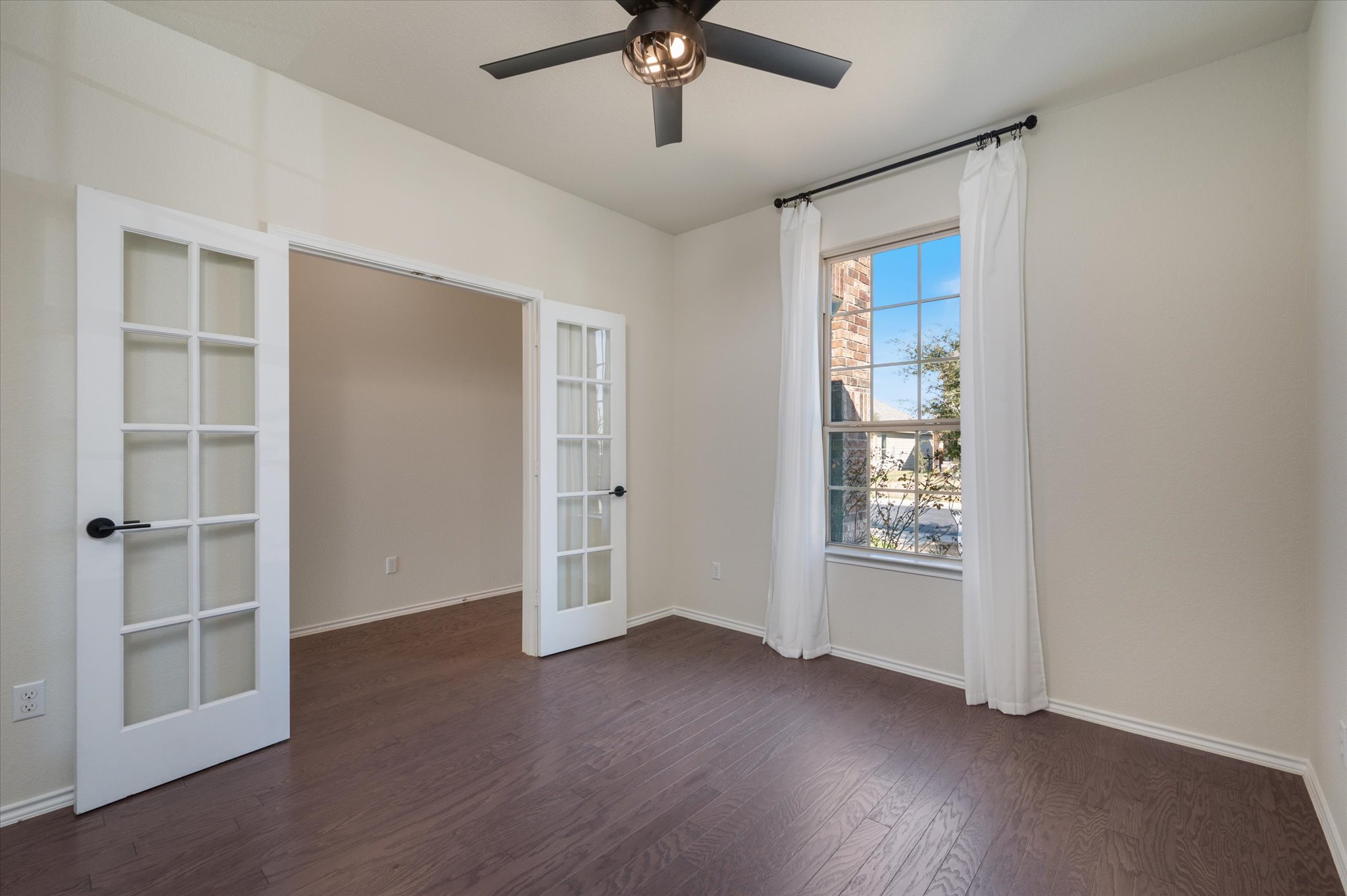 2044 Cliffbrake Way Georgetown, TX 78626 - Photo 6 of 40 Office at front of house with glass french doors. Wood floors.