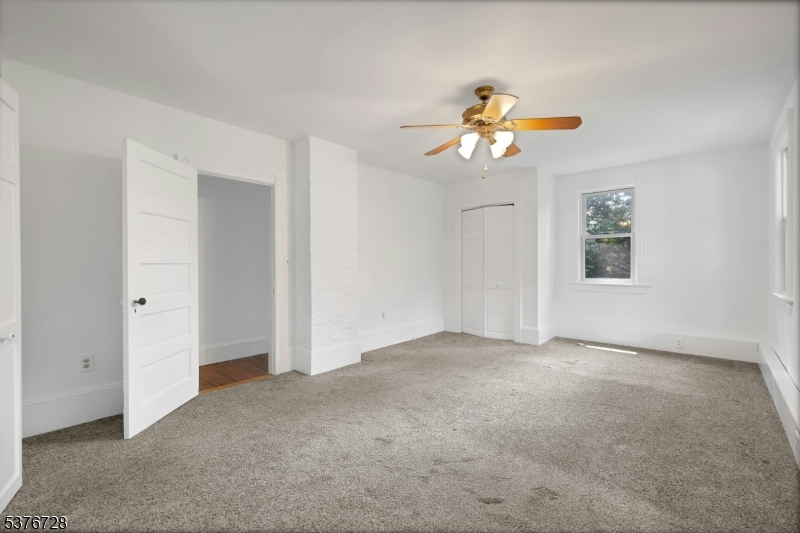 59 Main Street Peapack-Gladstone, NJ 07977 - Photo 13 of 30 a view of an empty room with window
