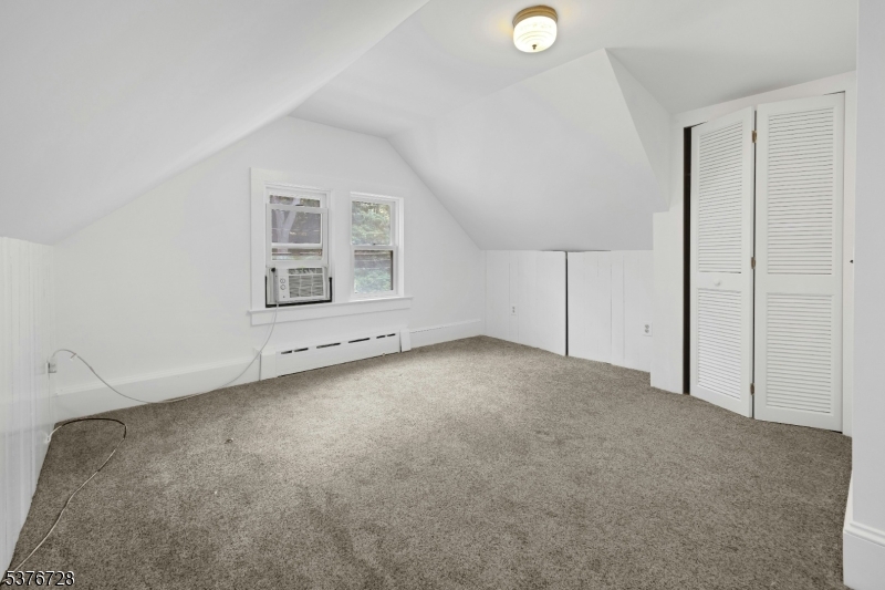 59 Main Street Peapack-Gladstone, NJ 07977 - Photo 17 of 30 an empty room with windows and closet