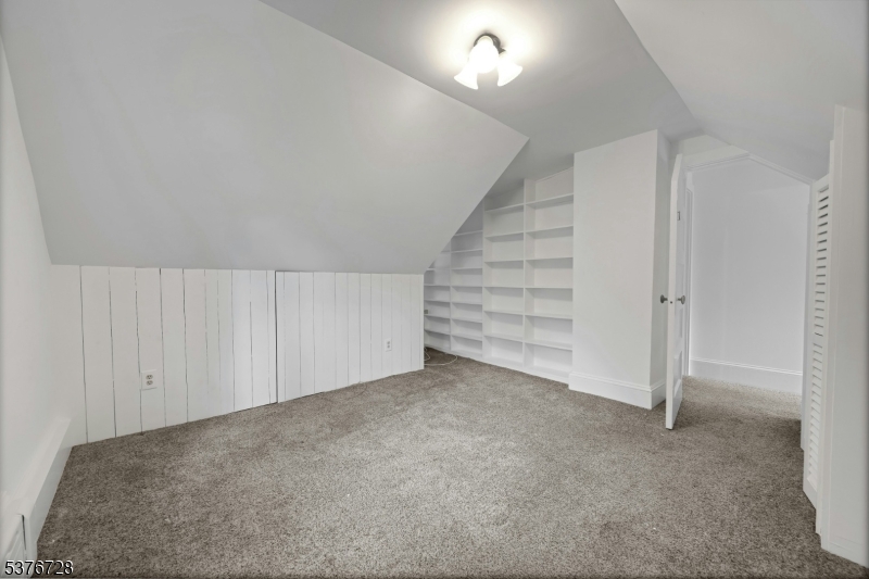 59 Main Street Peapack-Gladstone, NJ 07977 - Photo 21 of 30 an empty room with white walls and entryway