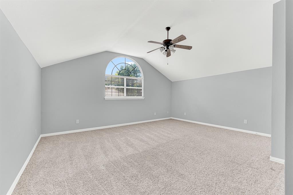 3500 Neiman Road Plano, TX 75025 - Photo 8 of 26 Head up the stairs to this deluxe room (Bedroom or Game Room) with vaulted ceiling and plush carpeting! An excellent fifth bedroom (it has a full bath), or even a wonderful game room and/or media room. Let your imagination roam free!