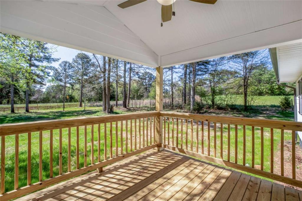 2159 Shiloh Road Greensboro, GA 30642 - Photo 6 of 43 a view of a porch with a yard