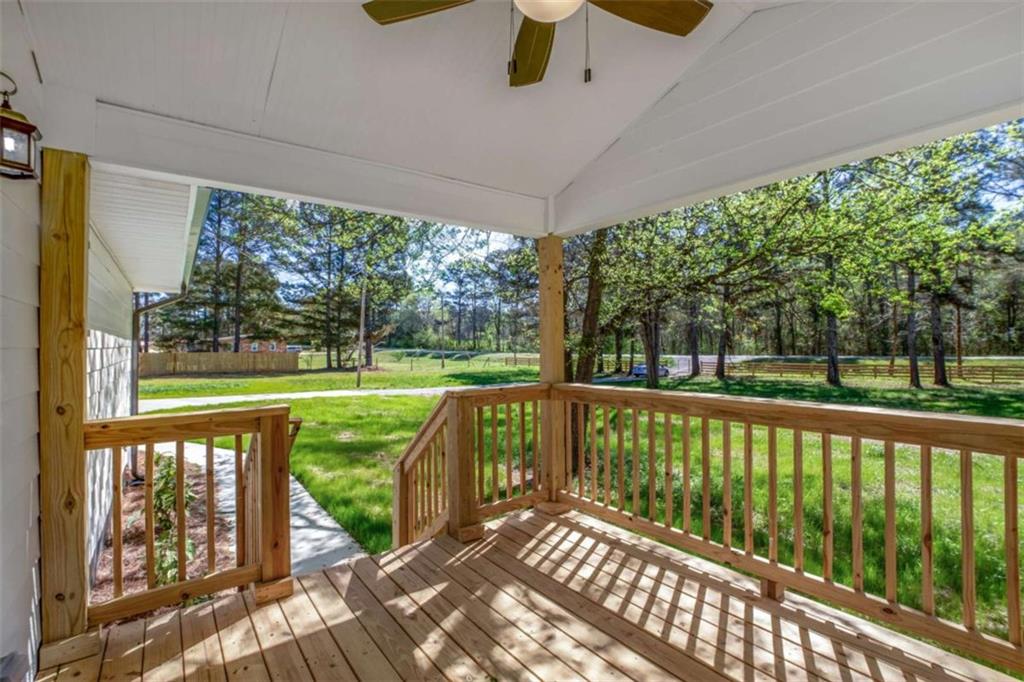 2159 Shiloh Road Greensboro, GA 30642 - Photo 7 of 43 a view of a wooden deck with a yard