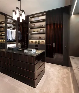 a bathroom with a sink vanity and a mirror