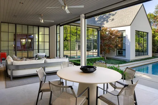 a view of a dining room with furniture window and outside view