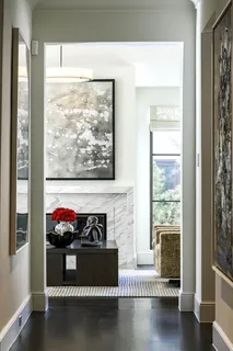 a view of a living room with a large window