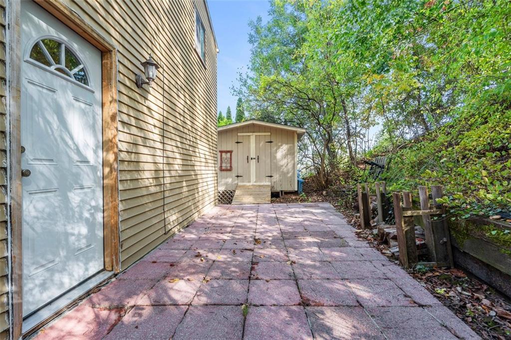 1670 Breining Street Pittsburgh, PA 15234 - Photo 31 of 39 a view of a pathway both side of house