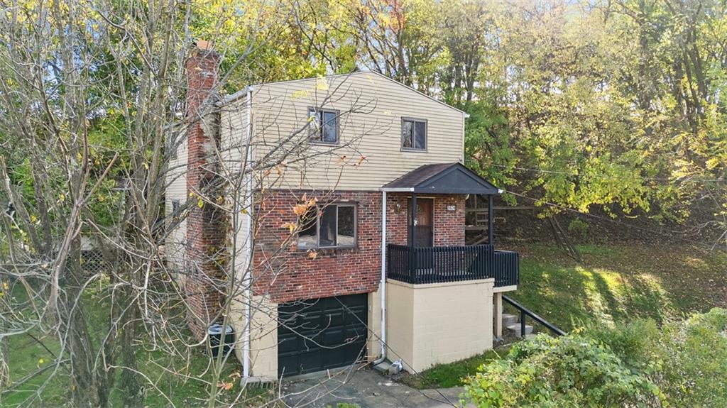 1670 Breining Street Pittsburgh, PA 15234 - Photo 4 of 39 an aerial view of a house with a yard