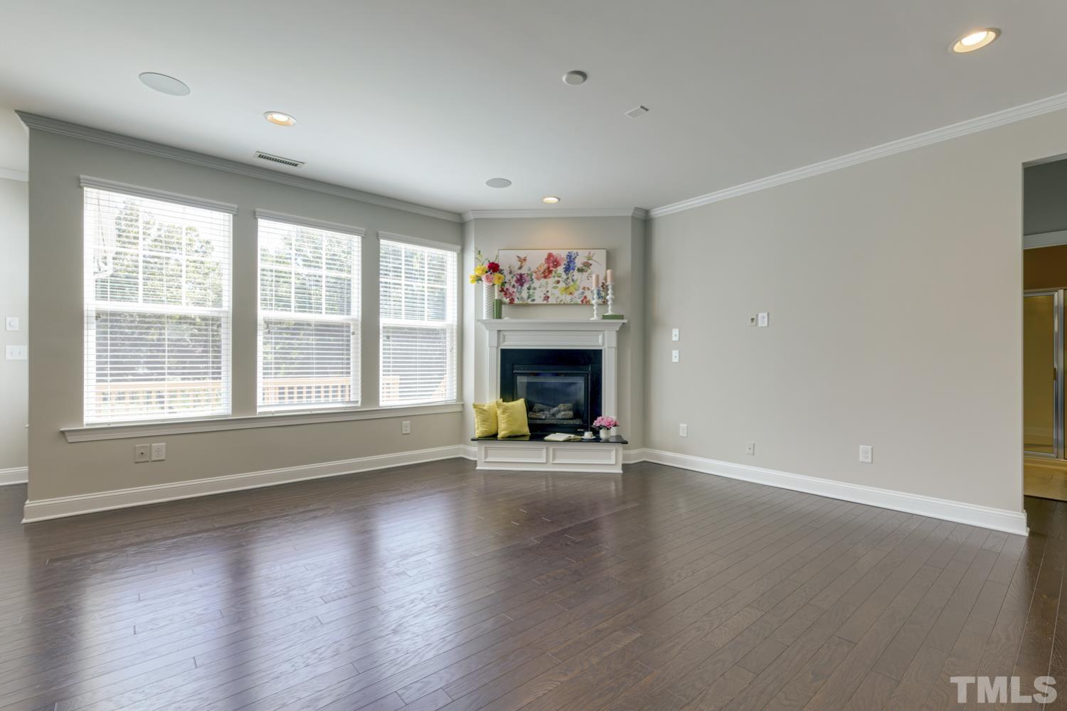 125 Victorian Oaks Drive Durham, NC 27713 - Photo 3 of 15 The gorgeous floors extend throughout the main level, tons of natural light flow thorough this home & there is new carpet and is freshly painted. Lovely detailing throughout on ceilings, trim etc.