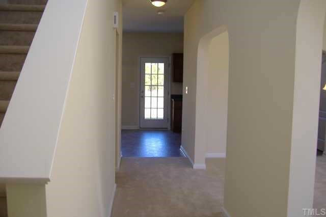 2604 Dutchman Creek Raleigh, NC 27610 - Photo 5 of 7 View from the entry foyer showing the details of the arched passways into the formal living room and dining room Other