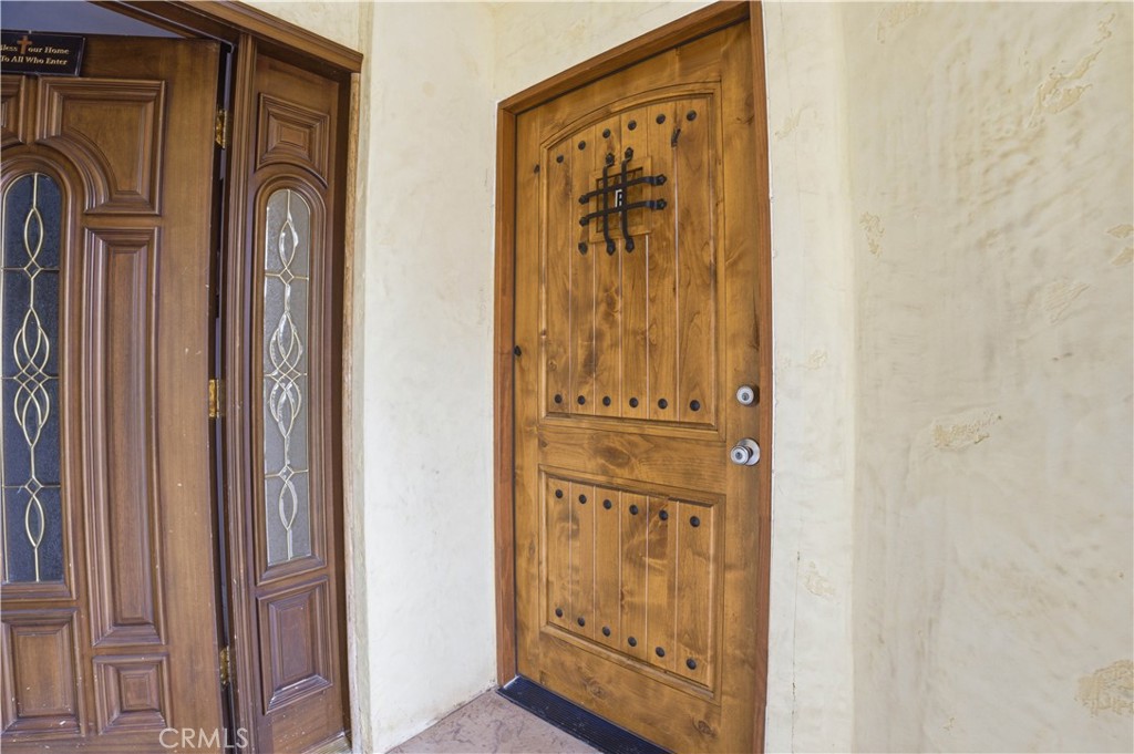1581 West Chanticleer Road, Unit B Anaheim, CA 92802 - Photo 11 of 13 a view of front door with a mirror