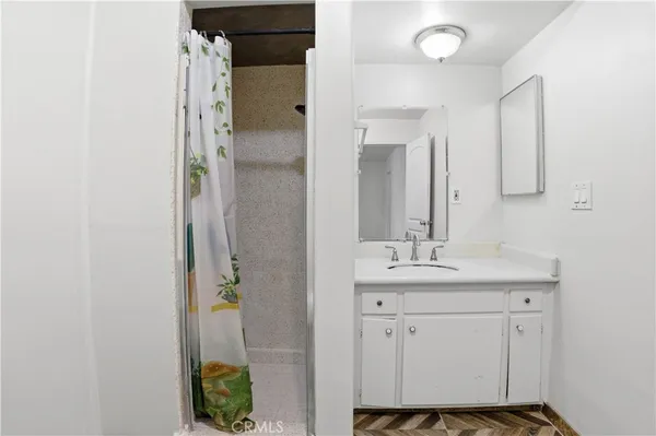 a view of front door with a mirror