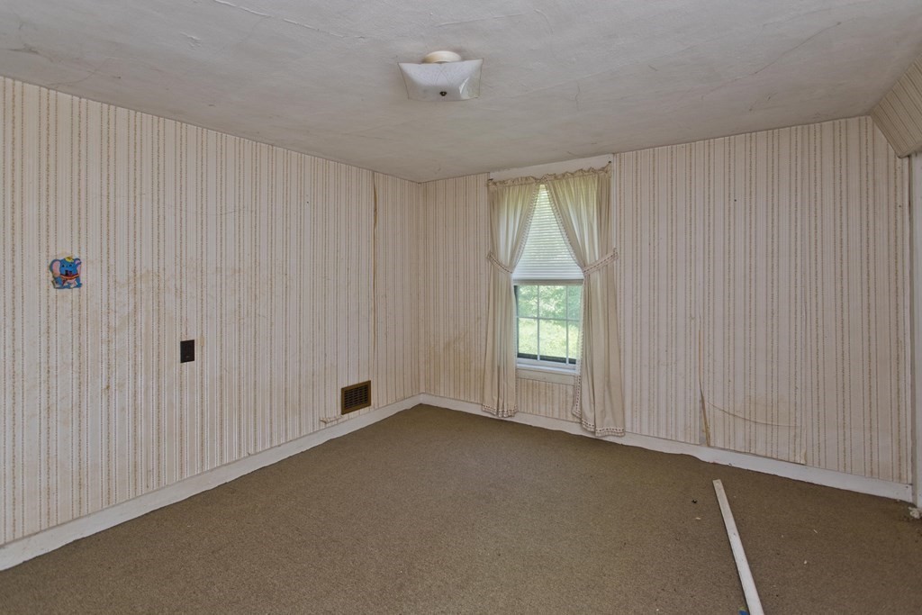 806 Colebrook River Road Tolland, MA 01034 - Photo 15 of 17 an empty room with windows
