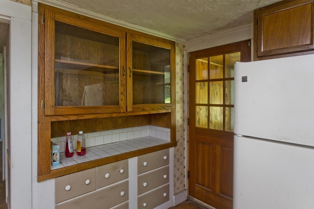 806 Colebrook River Road Tolland, MA 01034 - Photo 5 of 17 a bathroom with a sink and a mirror