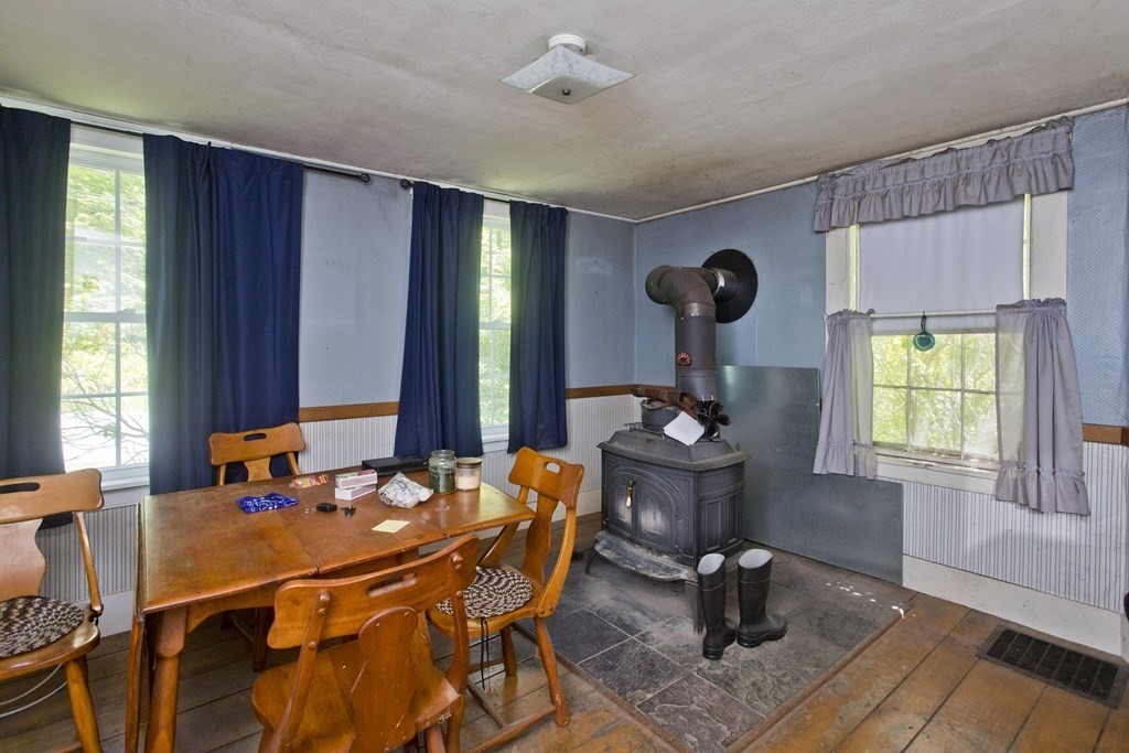 806 Colebrook River Road Tolland, MA 01034 - Photo 6 of 17 a dining room with furniture and window