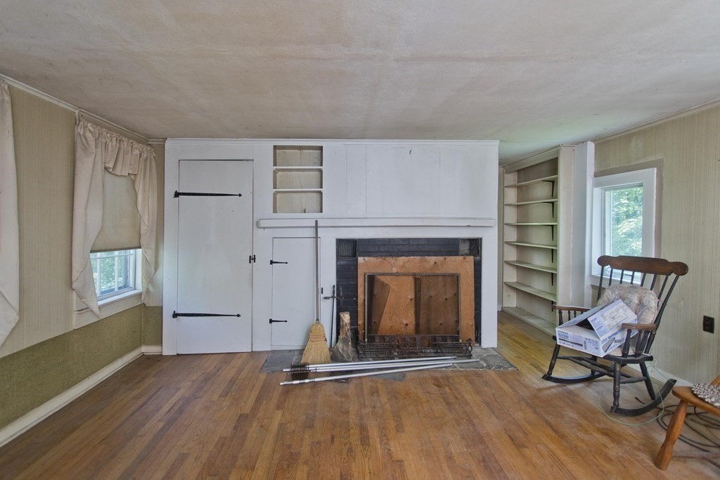 806 Colebrook River Road Tolland, MA 01034 - Photo 7 of 17 a view of a livingroom with furniture and a fireplace