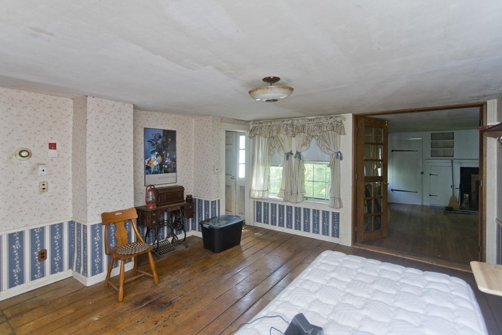 806 Colebrook River Road Tolland, MA 01034 - Photo 9 of 17 a view of a livingroom with furniture and windows
