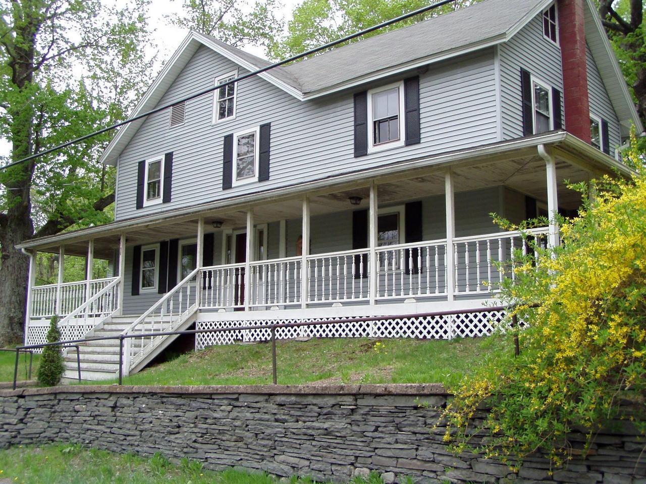 Spruce Cabin Road Cresco, PA 18326 - Photo 1 of 17 a view of a house with a small yard
