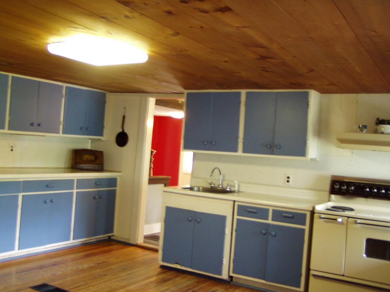 Spruce Cabin Road Cresco, PA 18326 - Photo 12 of 17 a kitchen with a sink stove and cabinets