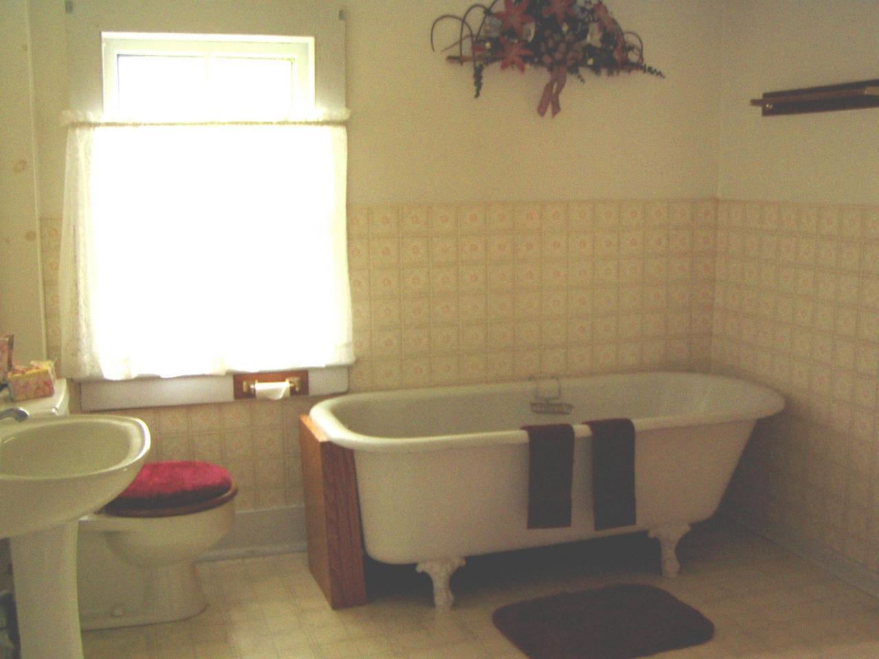 Spruce Cabin Road Cresco, PA 18326 - Photo 6 of 17 a white bath tub sitting in a bathroom